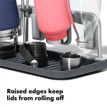 Load image into Gallery viewer, OXO Good Grips Water Bottle Drying Rack, in use.
