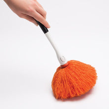 Load image into Gallery viewer, OXO Good Grips Microfiber Delicate Duster, in use.
