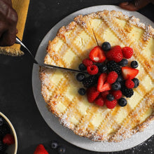 Load image into Gallery viewer, Lifestyle image of OXO Good Grips Cake Slicer &amp; Server - Stainless Steel, in use.
