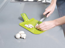 Load image into Gallery viewer, Joseph Joseph Chop2Pot Foldable Plastic Cutting Board, White
