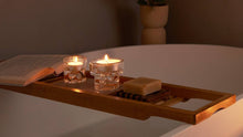 Load image into Gallery viewer, Lifestyle image of Bolsius Pack of 100 Tealight Candles, 4-hour Burn Time.
