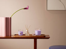 Load image into Gallery viewer, Lifestyle image of Bolsius True Scents Fragranced Candle in Glass - 80/73mm, Lavender.
