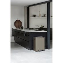 Load image into Gallery viewer, Lifestyle image of Brabantia Bo Pedal Bin - 60 Liters, Platinum.

