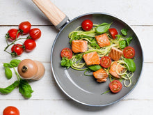 Load image into Gallery viewer, Lifestyle image of GreenPan Wood-Be Soirée Open Fry Pan - 28cm.

