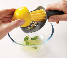 Load image into Gallery viewer, Joseph Joseph Catcher Citrus Reamer / Squeezer - Yellow
