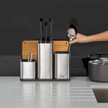 Load image into Gallery viewer, Joseph Joseph Counterstore100 Utensil Pot &amp; Chopping Board Set- Stainless Steel, 13 x 30.8 x 22.7 cm
