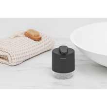Load image into Gallery viewer, Lifestyle image of Brabantia MindSet Soap Dispenser - Mineral Infinite Grey.
