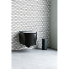 Load image into Gallery viewer, Brabantia Toilet Roll Dispenser in ideal bathroom setting.
