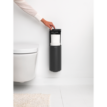 Load image into Gallery viewer, Brabantia Mindset Toilet Roll Dispenser in use.
