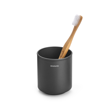 Load image into Gallery viewer, Brabantia MindSet Toothbrush Holder - Mineral Infinite Grey, with toothbrush.
