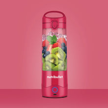Load image into Gallery viewer, Lifestyle image of Nutribullet Portable Blender with Handled Sip Lid, 475mL - 100W, Magenta.
