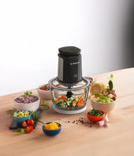 Load image into Gallery viewer, Lifestyle image of Nutricook Glass &amp; Stainless Steel XXL Chopper &amp; Mincer - 2 Liters, Black, in use.
