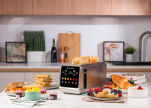 Load image into Gallery viewer, Nutricook 4-Slice Smart Toaster With Touch Screen, Stainless Steel - 1450W, in use.
