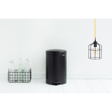 Load image into Gallery viewer, Lifestyle image of Brabantia New Icon Pedal Bin, 20 Liters - Matt Black.
