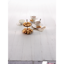 Load image into Gallery viewer, Lifestyle image of Lekue Silicone Mini Madeleines Mold, 20 Holes - Black.
