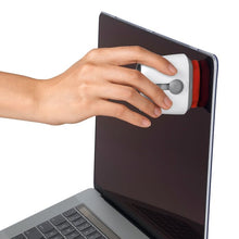 Load image into Gallery viewer, OXO Good Grips Sweep &amp; Swipe Laptop Cleaner, in use on laptop screen.
