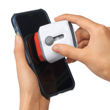 Load image into Gallery viewer, OXO Good Grips Sweep &amp; Swipe Laptop Cleaner in use on mobile phone.
