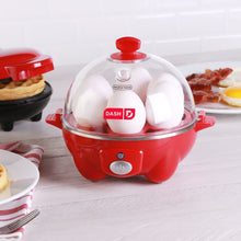 Load image into Gallery viewer, Dash Rapid Egg Cooker: 6 Egg Capacity Electric Egg Cooker for Hard Boiled Eggs, Poached Eggs, Scrambled Eggs, or Omelets with Auto Shut Off Feature - Red
