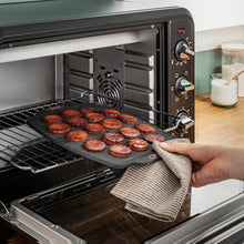 Load image into Gallery viewer, Tefal Crispybake Silicone Canneles, 10 pieces - 29 x 21cm
