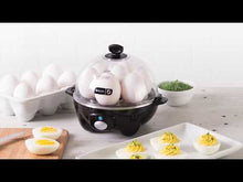 Load and play video in Gallery viewer, Dash Rapid Egg Cooker: 6 Egg Capacity Electric Egg Cooker for Hard Boiled Eggs, Poached Eggs, Scrambled Eggs, or Omelets with Auto Shut Off Feature - Black
